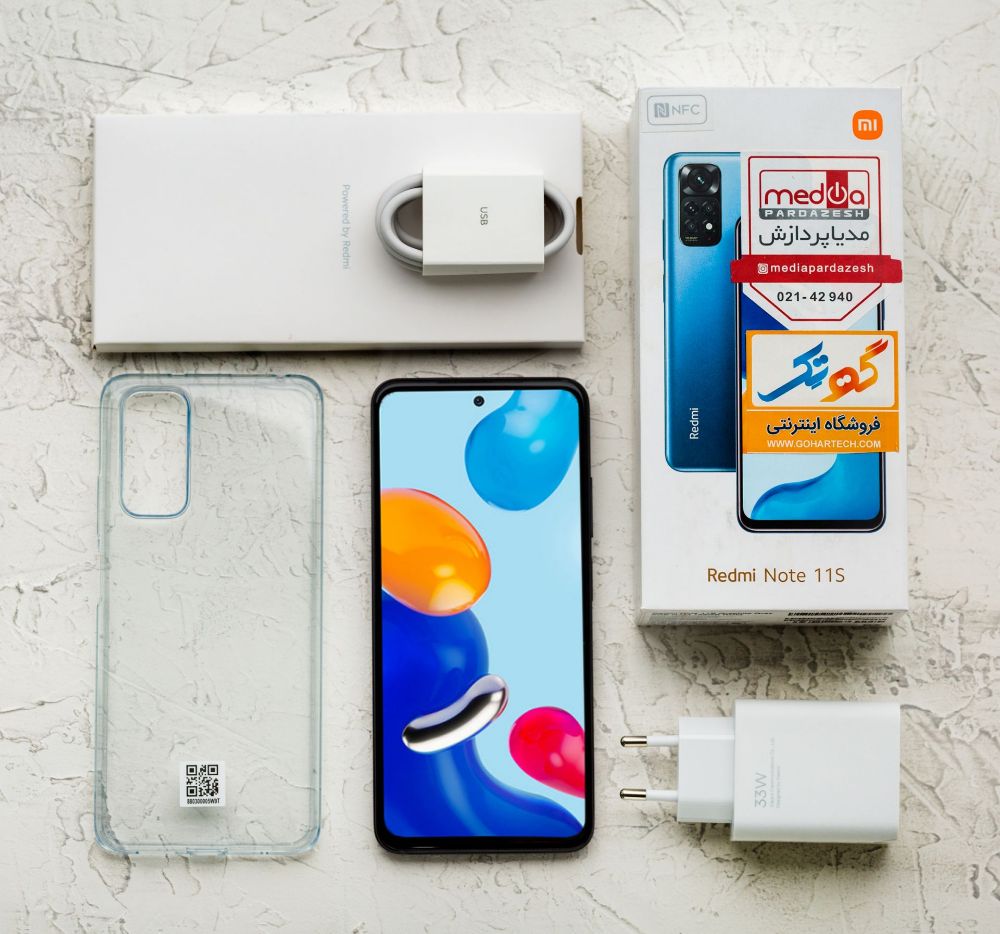 The contents of the Note 11S phone box include a manual, a Xiaomi charger adapter, a USB Type-C cable, a SIM card removal needle and a gel cover.